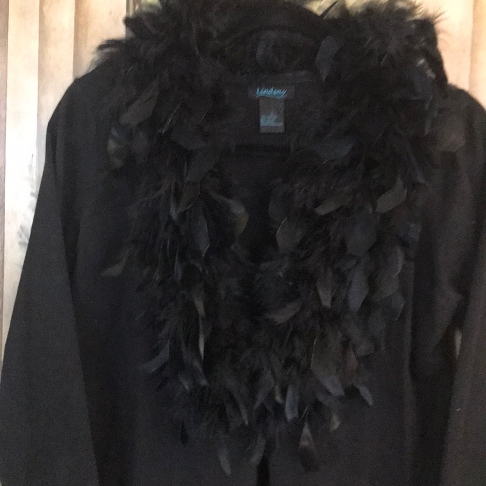 A Cardigan Sweater with Feathers